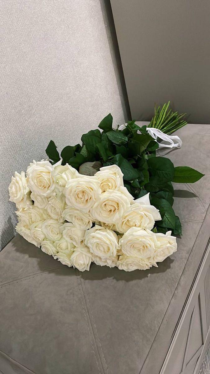 Professional floral arrangement in modern corporate setting